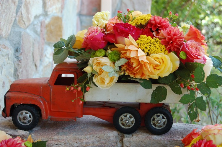 floral arranagement in toy dump truck